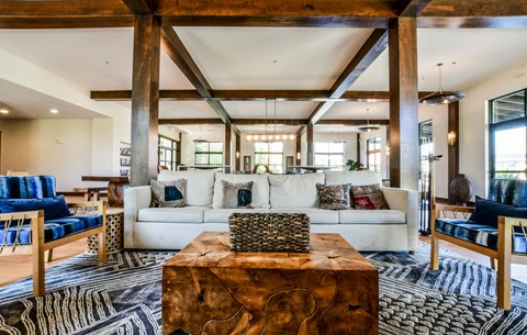 a living room with a white couch and a coffee table